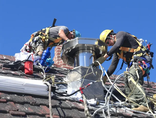 Protective chimney cap installed by Warwick Chimney Sweep in Warwick, RI