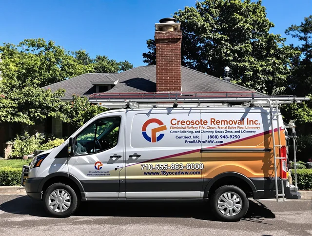 Warwick Chimney Sweep technician removing creosote safely in Warwick, RI